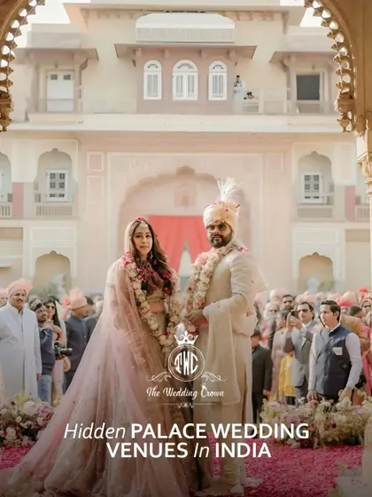 I help couples find hidden palace wedding venues across India to bring their royal wedding dreams to life. This image of a couple during their varmala at a majestic palace captures the grandeur I can create.