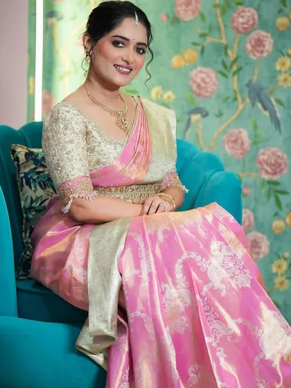 The complete look. Nupura's custom blouse and saree create a graceful and sophisticated outfit, perfect for a daytime family celebration.