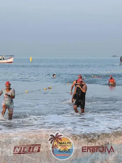The Australian exit during the Malpe Triathlon swim. Running out of the water and back in for each loop is a unique challenge that tests your transition skills and endurance.