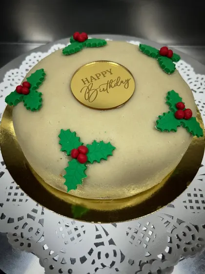 A birthday in December calls for something extra festive. This is my traditional Christmas fruit cake, covered completely in a layer of pure almond marzipan and decorated with holly.