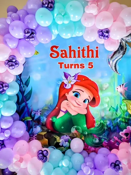 A close-up of the Little Mermaid backdrop.