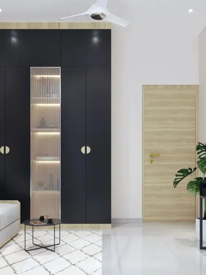 The floor-to-ceiling wardrobe in the home office provides massive amounts of storage, with a central glass-fronted section for display.