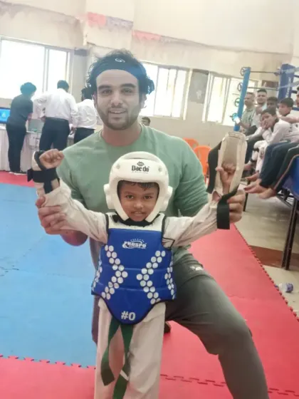 With my student Uzaif right after his victorious match. Seeing my students succeed is the greatest reward for a coach.