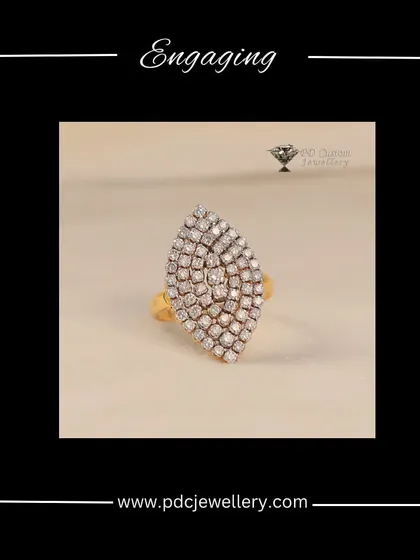 An engaging and stylish leaf-shaped diamond ring in 18kt gold. The elongated design is both elegant and eye-catching, perfect for someone who loves unique jewellery.