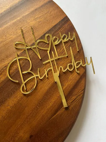 A classic "Happy Birthday" topper in a beautiful gold mirror acrylic script. This timeless design is one of our affordable options, perfect for everyday celebrations.