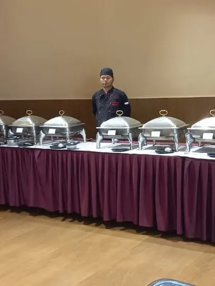 An elegant buffet with deep purple skirting for a house party at Brigade Cornerstone Utopia.