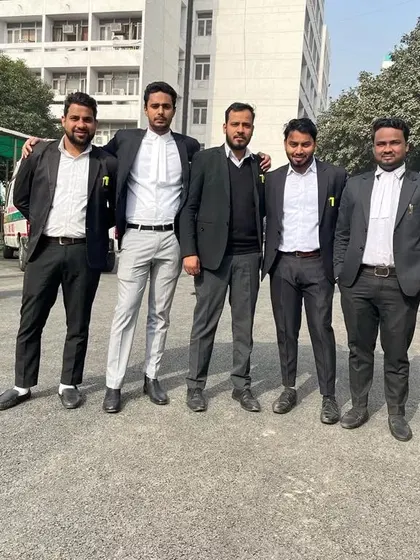 My team and I, ready for the day's work at the court complex.