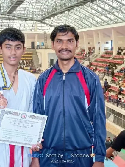 With my student after he won a bronze medal at the 13th State Level Karate Championship 2022 in Bengaluru.