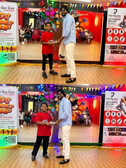 Two more proud students receiving their token of appreciation after a fantastic performance at the showcase.