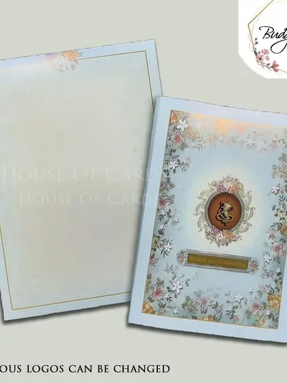 A traditional invitation with a floral pastel blue background and a Ganesha emblem, with the option to change religious logos.