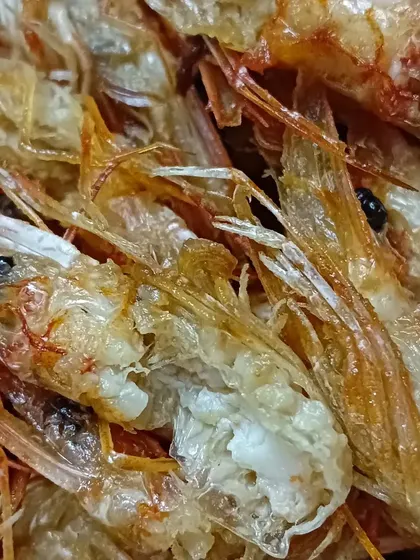A detailed macro shot of the dried shrimp, showing their texture and quality. I sell these by weight for your home cooking needs.