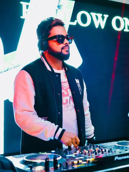 A shot of me at the console during the launch of Mirror Nightclub, with my branding visible on the screen behind me.
