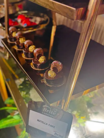 A row of individual Nutella cakes, ready to be served.