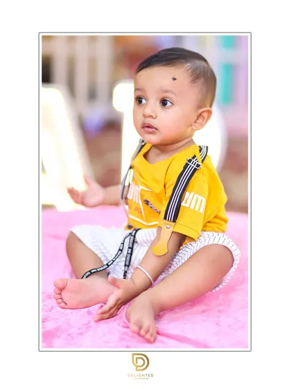 Capturing the natural curiosity of a one-year-old during his portrait session.