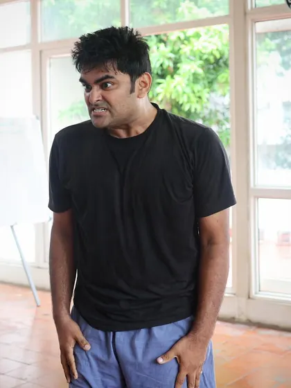 An actor makes a face during a "Gretel" rehearsal.