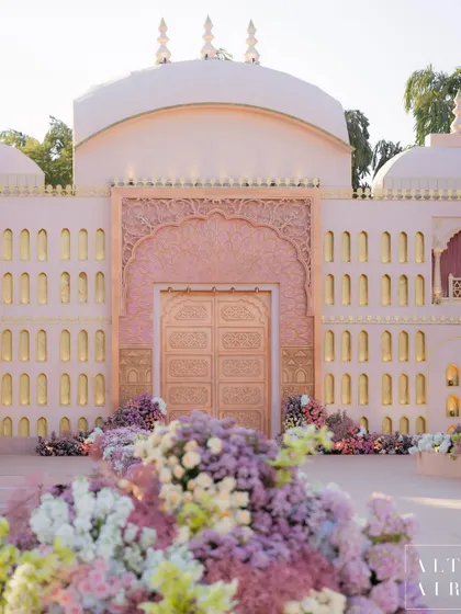 The grand entrance to 'Saanjh Niwas', where muted colors, clean lines, and artisanal florals came together. This facade was designed to be rooted in culture yet reflect a new, modern India.