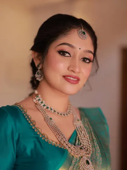 A detailed close-up of the eye makeup and glowing skin. I use high-quality products to ensure the makeup not only looks good but also feels comfortable.