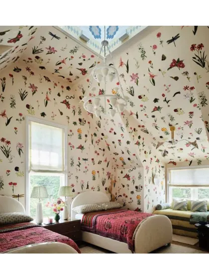 A child's bedroom becomes a whimsical wonderland with this delicate floral and dragonfly wallpaper. Covering the walls and vaulted ceiling creates an immersive, magical space that sparks imagination.