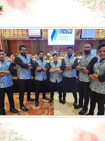 Our team in custom uniforms for the Nesco Foods exhibition. We provide professional and branded bar services for corporate exhibitions and trade shows.