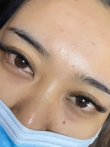 A 2D lash set, perfect for those new to volume. It offers a fuller, darker lash line than classic lashes but is more subtle than a full Russian volume set.