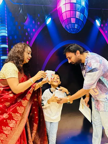 A happy moment as Aarav is presented with his certificate and gift. Celebrating success is a huge part of our culture at Spectrum World.