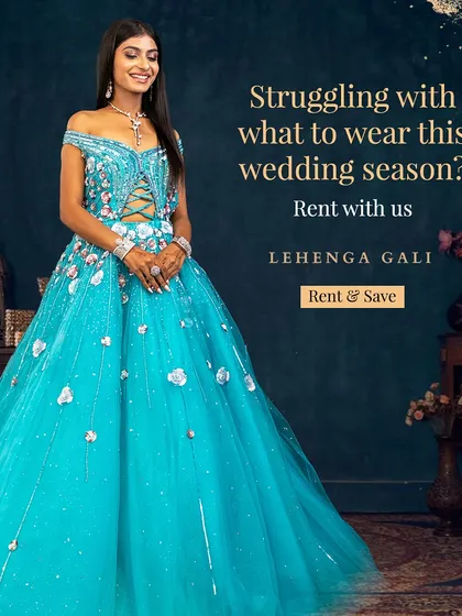 For your fairy tale moment, we have the perfect gown. This breathtaking, off-the-shoulder blue gown with delicate floral appliqué is designed to make you feel like royalty, and it's available to rent for your reception or special event.