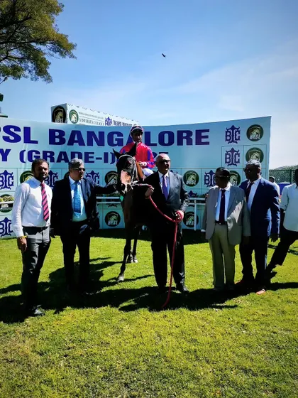 Mountain Jewel, with jockey Akshay Kumar, after winning the memorial million.