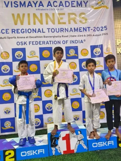 The winners' podium is a familiar sight for my students. Here are four of our champions from the CISCE Regional Tournament, showcasing their well-earned medals.