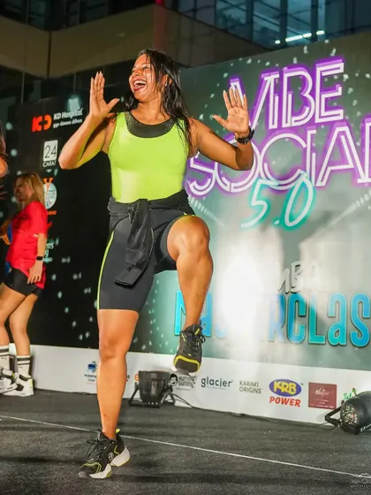 A powerful, happy expression captured mid-dance at Vibe Social.