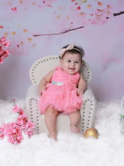 A full view of the enchanting cherry blossom set, complete with a miniature armchair, fluffy white clouds, and delicate pink flowers.