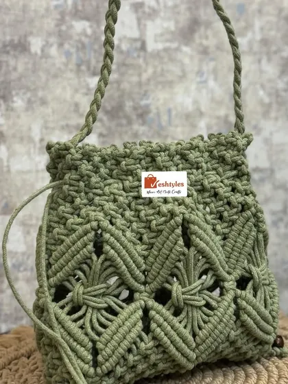 A final look at the beautiful olive green potli bag, a perfect accessory for any ethnic wear.