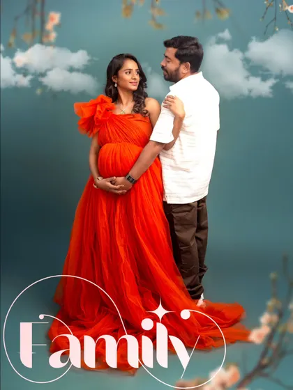 A romantic couple's portrait where the vibrant red gown truly pops. The word "Family" overlaid on the image emphasizes the new chapter they are beginning together.