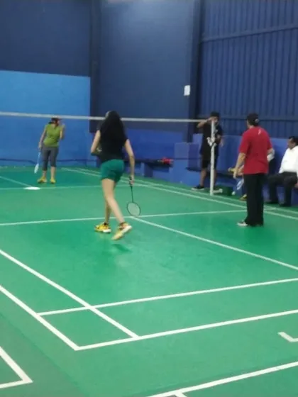 A glimpse of a mixed doubles match in action. Our courts are open to everyone, perfect for players of all skill levels to enjoy a friendly game of shuttlecock.