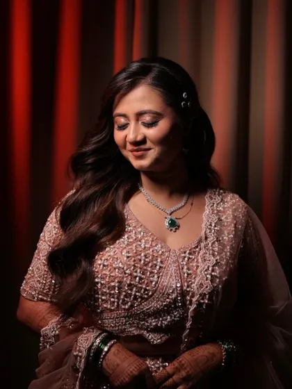 A beautiful portrait of Pranjali. The soft lighting highlights her radiant skin and the delicate shimmer on her eyes.