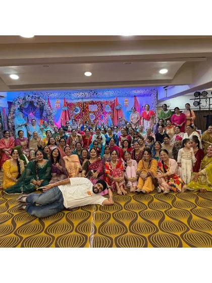 Having fun with all the amazing ladies at a Teej celebration. I love being part of cultural events and bringing the community together with music.