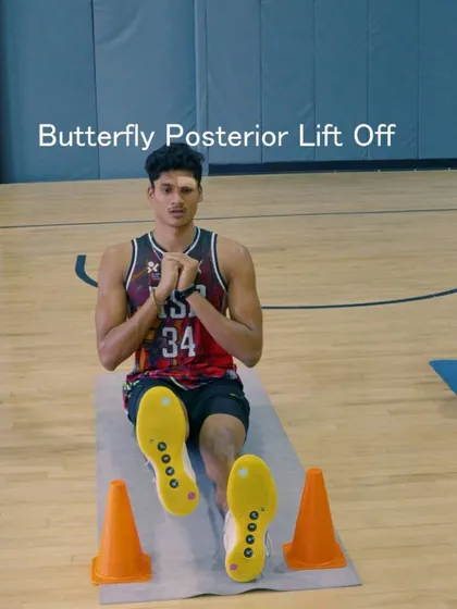 A still image capturing the controlled movement of the butterfly posterior lift-off mobility drill.