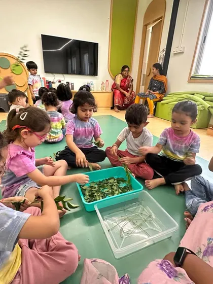 Each activity, from making Bhel Puri and toast to plucking methi leaves and exploring what floats, is a lesson in itself. These practical life and sensorial activities are central to the Montessori method, helping children develop fine motor skills, concentration, and a deep understanding of the world through their own actions.
