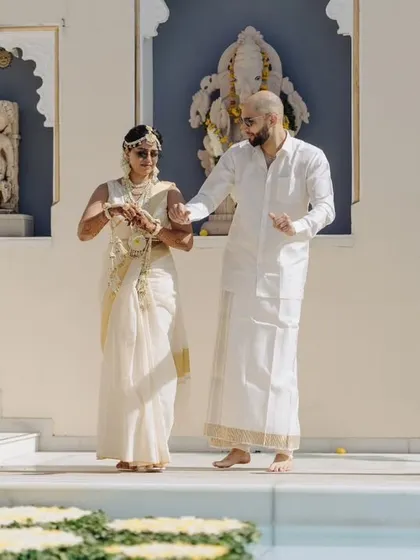 A fun-filled Haldi ceremony in Udaipur, where the couple, dressed in traditional white and gold, danced and celebrated by the pool.