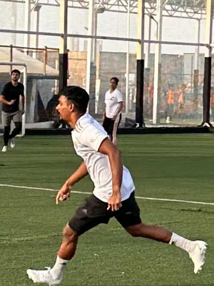 A candid shot from the football game. I believe in leading by example and staying active in the sports I love.