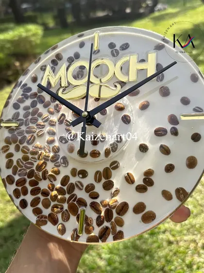 For all the coffee lovers, this 8-inch desk clock is a perfect piece. I used actual coffee beans cast in resin to create this unique design for a cafe brand. It comes with a metal stand, making it ideal for a desk or side table.