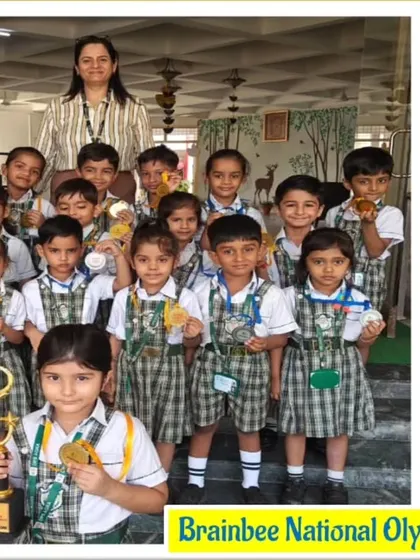 More winners from the Handwriting (Group A) competition at DPS Agra, celebrating their 2024 achievement.