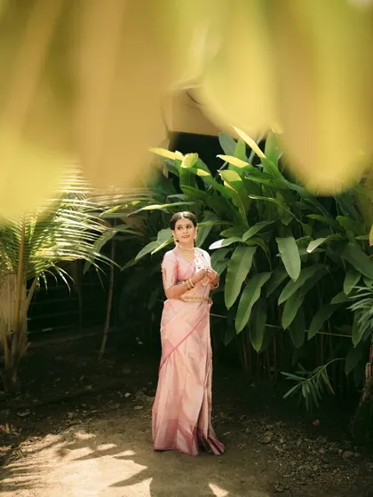 A beautiful, classic portrait of the bride in her garden setting.