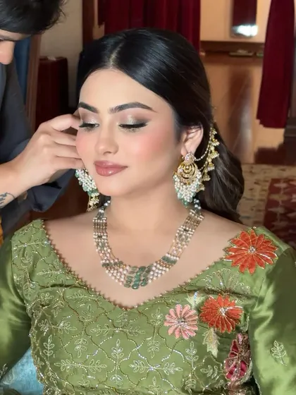 When less is more. This client looks radiant with a soft, smoky eye and glossy lip for her Mehendi, proving that subtlety can be incredibly stunning.