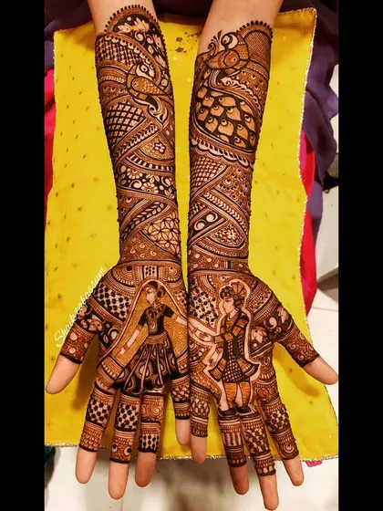 A modern and playful design featuring full-length portraits of the bride and groom in stylish attire. The background is filled with dense, abstract patterns and peacock motifs.