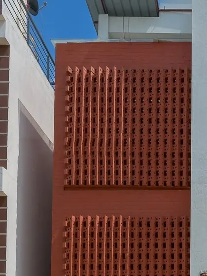 A detail shot of the dynamic brick feature. This element brings so much life to the design, creating patterns of light and shadow that change throughout the day.