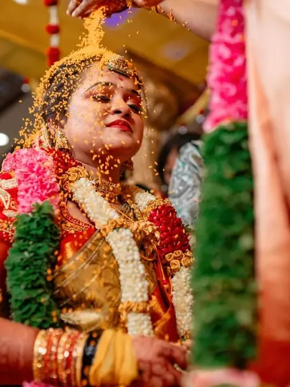 A duplicate of 100, capturing the blessings and rituals of the wedding ceremony.