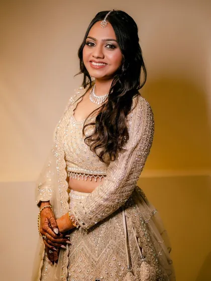 Krisha looking absolutely beautiful. The soft waves and minimal makeup create an elegant and timeless look.