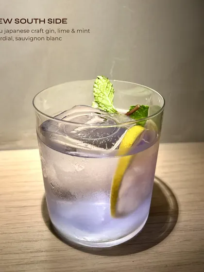 The New South Side, a refreshing gin cocktail with lime, mint, and sauvignon blanc.