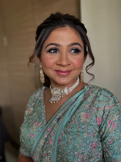 A candid, smiling shot. The client looks happy and confident.
