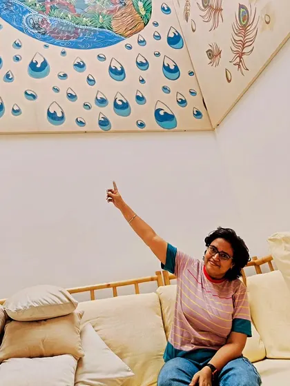 Here I am in the finished space, sitting within the installation. This gives a sense of the scale of the paintings and the feeling of being completely surrounded by the art.